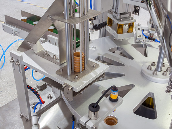 coffee capsule filling and sealing machine