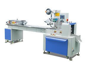 Flow wrapping machine