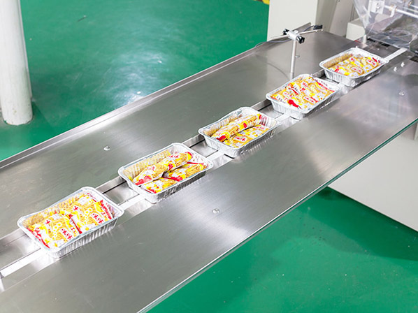 flow wrapper packaging machine